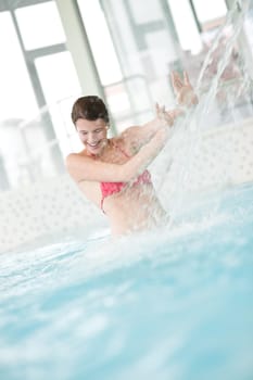 Swimming pool - beautiful woman in bikini