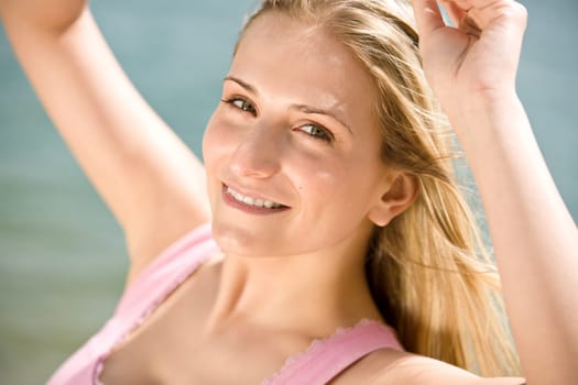 Blond woman enjoy summer sun