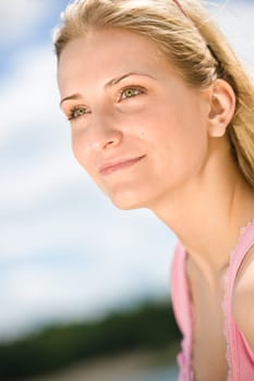 Blond woman enjoy summer sun