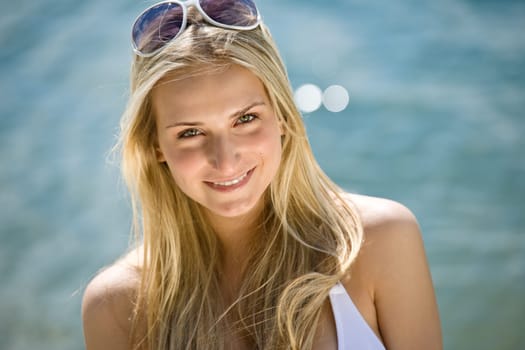 Blond woman enjoy summer sun
