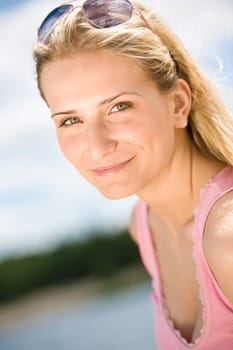 Portrait of beautiful blond woman enjoy sunny day