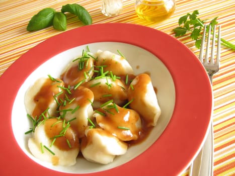 Pelmeni in mushroom cream sauce
