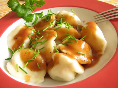 Pelmeni in mushroom cream sauce