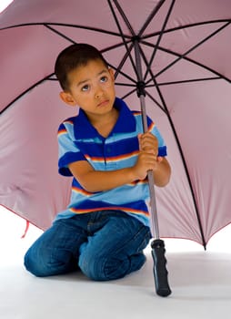 cute boy under huge umbrella