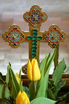 Easter cross with spring flowers