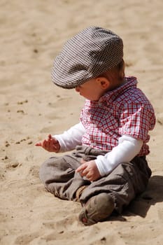 Boy in sand