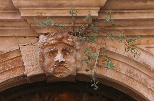 Stucco mask on the facade
