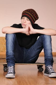 The teenager with a skateboard