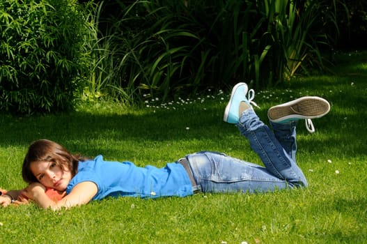 Teenage girl on a meadow