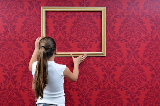 Girl with picture frame