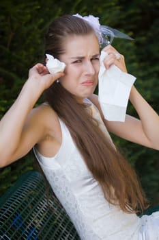 unhappy bride on bench