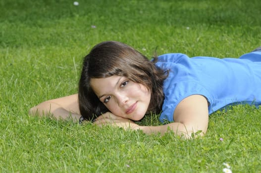 Teenage girl on a meadow