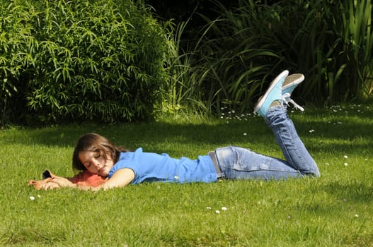 Teenage girl on a meadow