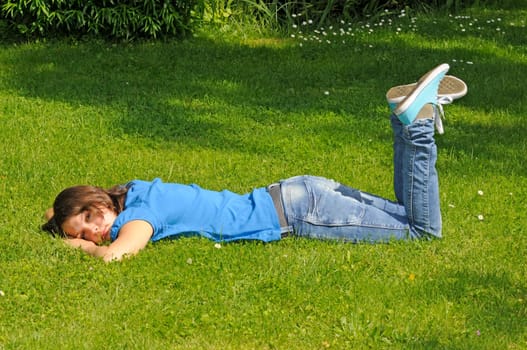 Teenage girl on a meadow