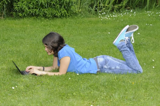 Teenage girl with netbook
