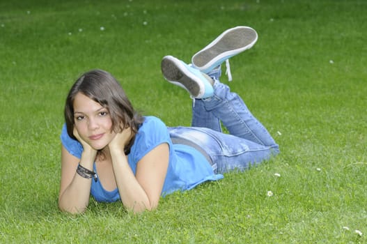Teenage girl on a meadow