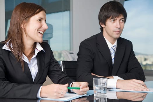 Businessman with assistant laughing