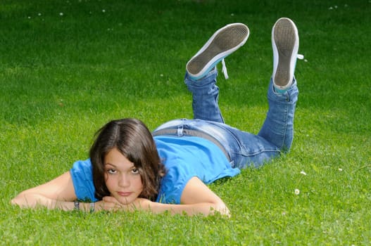 Teenage girl on a meadow