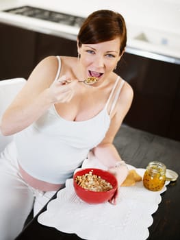 pregnant woman drinking water