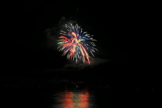 Fireworks And Reflected Colors