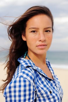 Portrait of a beautiful woman with freckles