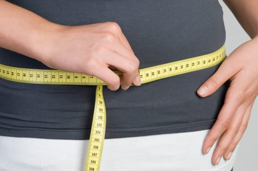 hold the measuring tape