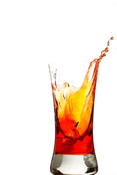 Ice cube falls in red
