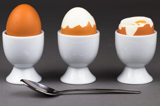 Three eggs with spoon