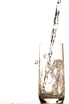 Water flows into glass