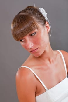 portrait of sad bride in studio