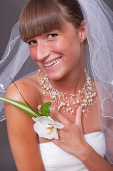 laughing bride with flower