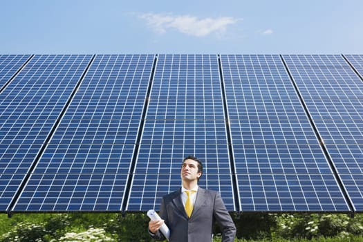 businessman and solar panels