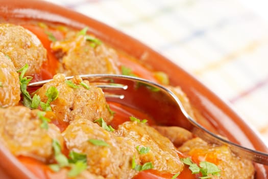 Fresh meatballs with peas