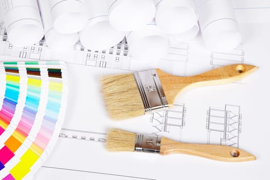 Two paintbrushes and color guide