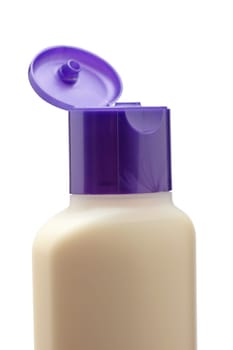 Opened plastic bottle with soap or shampoo