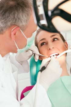 Patient at the dentist - treatment with Bo