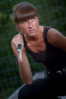 woman with bloody knife