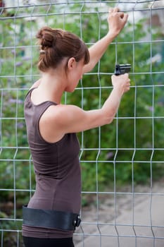 female agent shooting