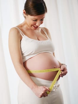 pregnant woman drinking water