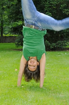 Teenage girls doing cartwheels
