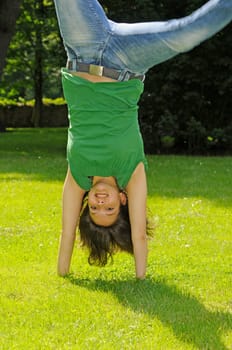 Teenage girls doing cartwheels