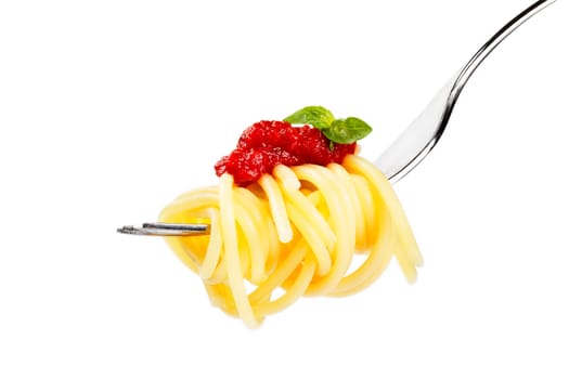 Spaghetti on fork sauce basil