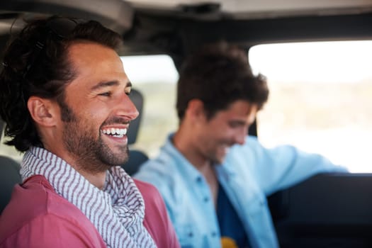 Travel, driving and happy men friends in a car for road trip, adventure or vacation together. Freedom, transportation and people laughing in a vehicle for holiday, trip or journey in the countryside.
