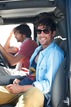 Travel, portrait and happy men friends in a car for road trip, adventure or vacation together. Freedom, transportation and people relax in vehicle for holiday, trip or journey while chilling outdoor.