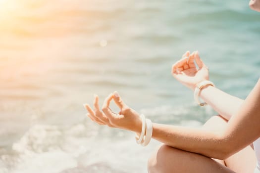 Close up Hand Gesture of Woman Doing an Outdoor Lotus Yoga Position. Close up. Blurred background