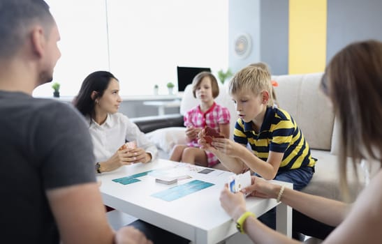 Portrait of children spend time with parents, mother entertain kids with games on holiday. Childhood, fun, family, love, parenthood, development concept