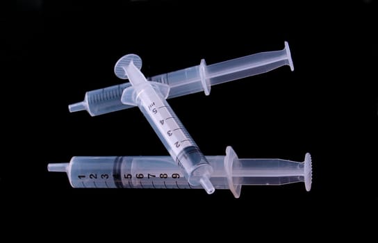 Hypodermic syringe and needle used for immunization.