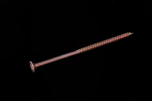 Steal wood screw on a black background.