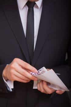 holding and counting money