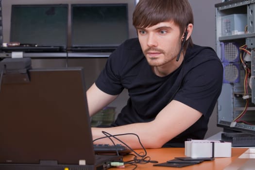 male programmer with headset